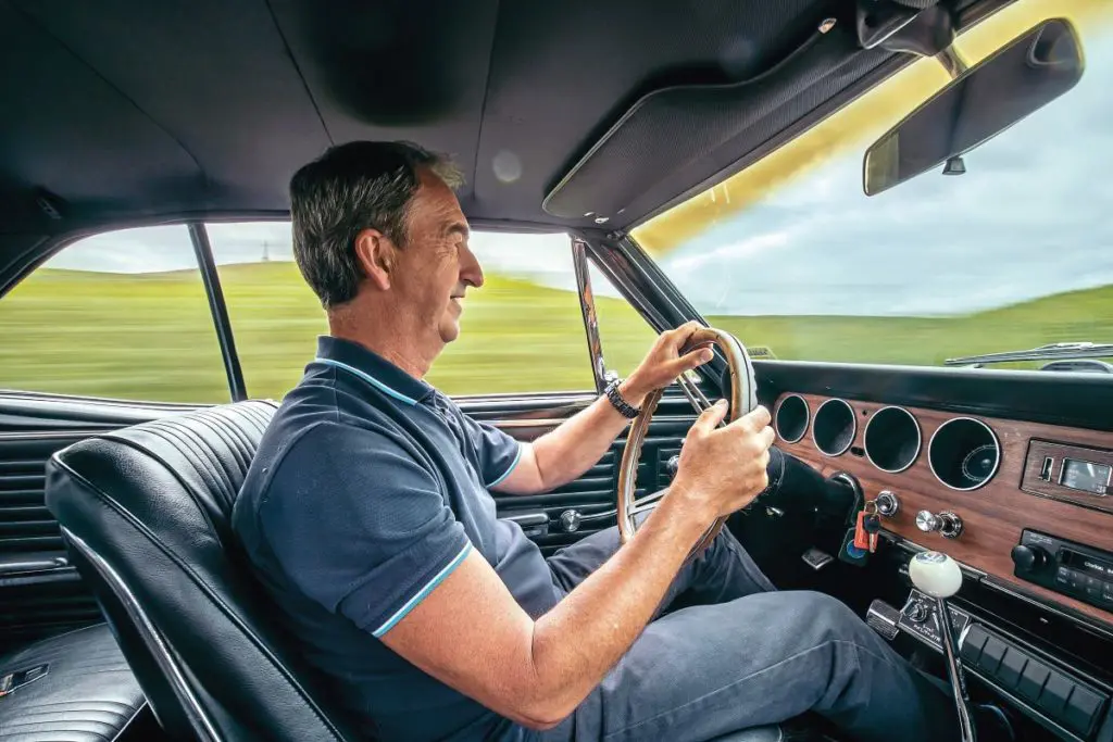 Ian McDonald behind the wheel of his Pontiac GTO