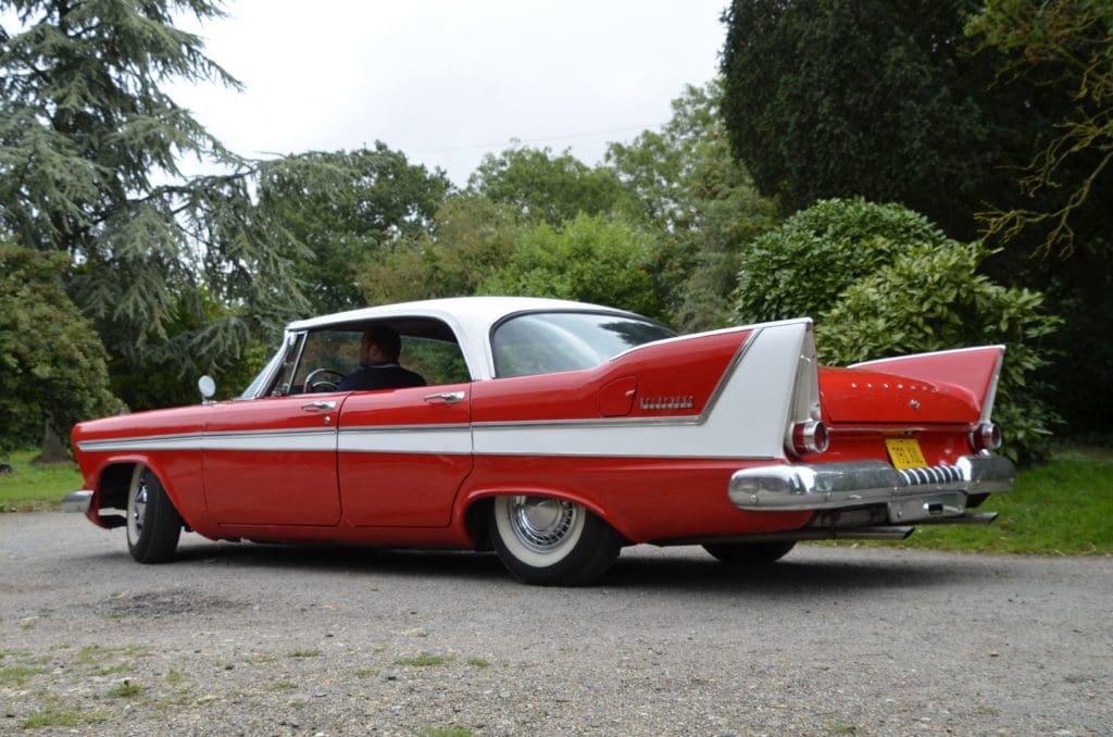 Back view of red 1958 Plymouth Fury