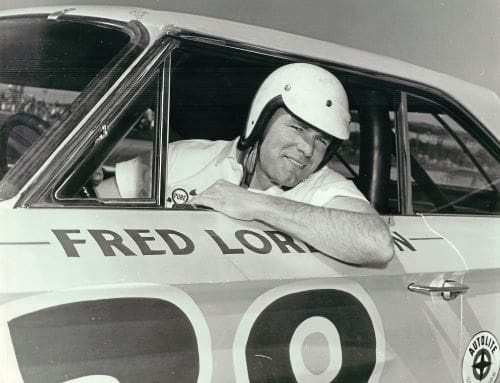 ‘Fast Freddie’ Lorenzen leaning out car window wearing a helmet