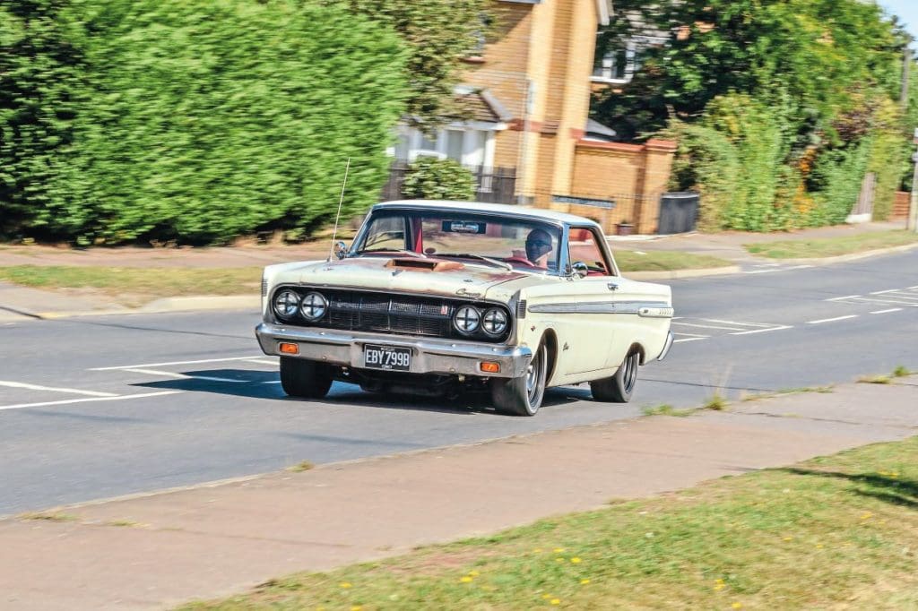 Marc driving his 1964 Mercury Comet on the road