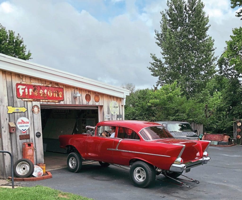 The Chevrolet 210 'Cherry Bomb' pulling into an open garage.