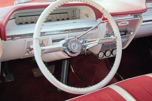 White steering wheel in Tamir's 1961 Buick Invicta