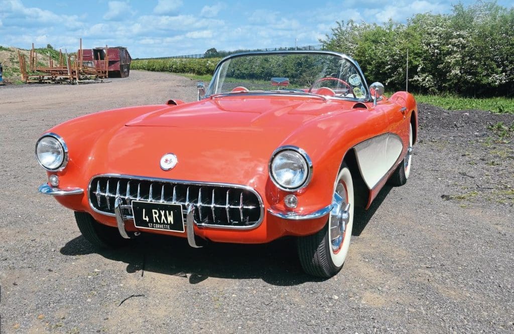 Bob West's parked red 1957 Chevrolet Corvette Roadster